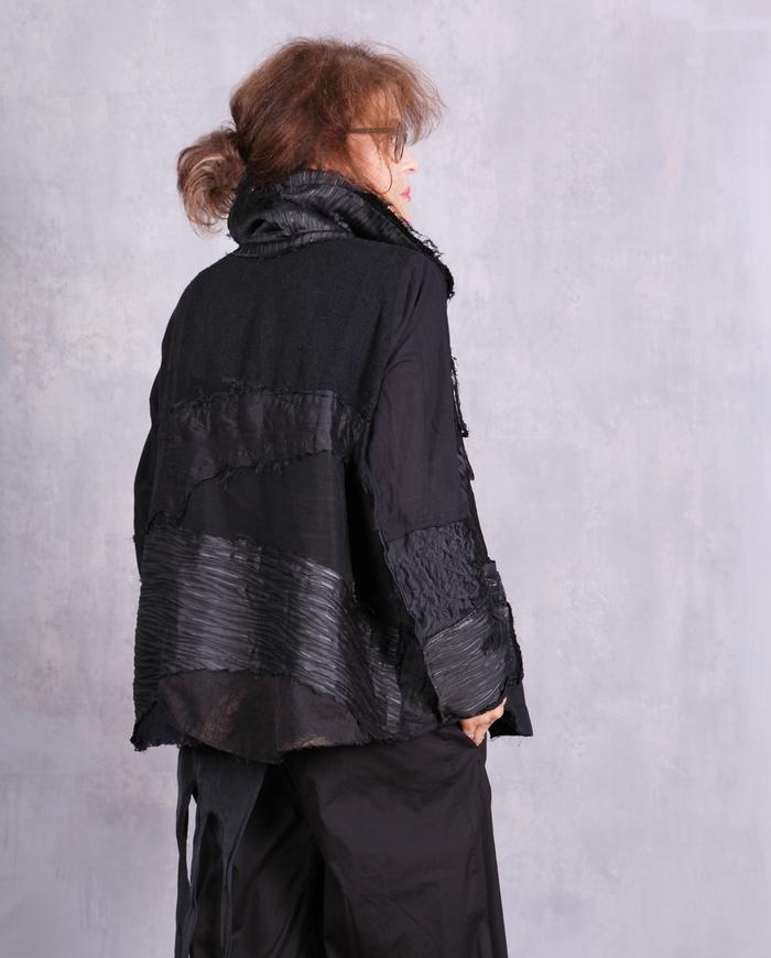 'pieced for comfort' shades of black jacket